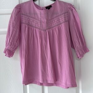 JCrew top, light pink/lavender color. Size medium, good condition.